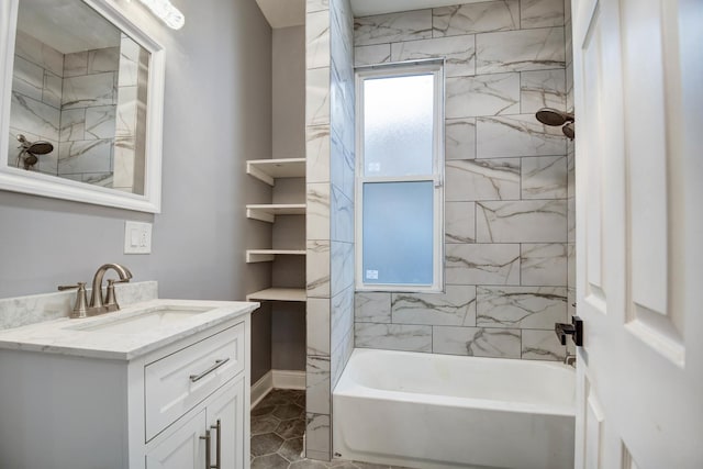 full bath featuring tile patterned floors, vanity, and bathtub / shower combination