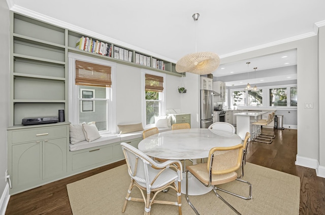 dining space with crown molding, plenty of natural light, and dark wood-type flooring