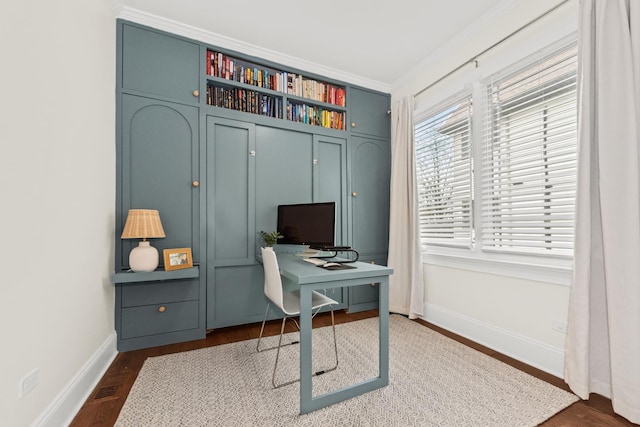 home office with ornamental molding, baseboards, and dark wood-type flooring