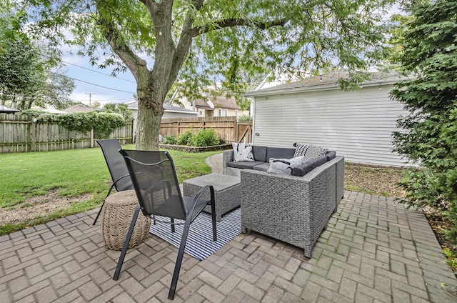 view of patio / terrace featuring an outdoor hangout area and a fenced backyard