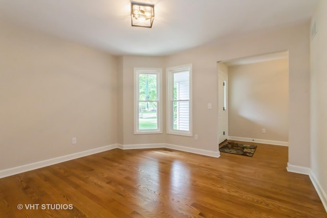 2509 Oak Trails Dr, Aurora, IL 60506 - spare room with wood finished floors and baseboards