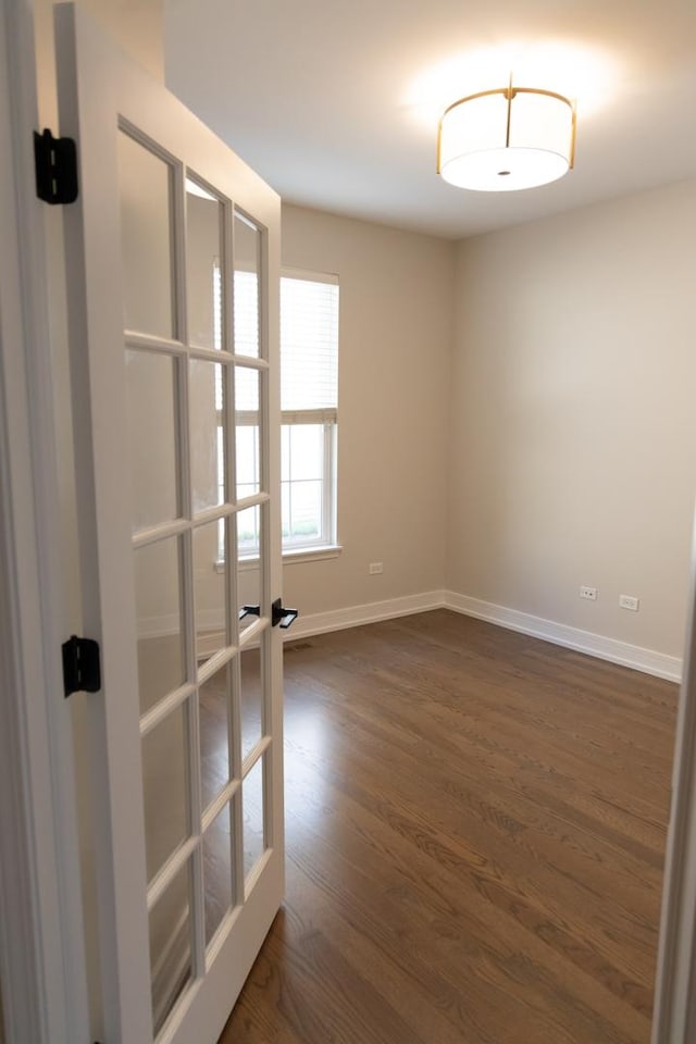 2836 Hillcrest Cir, Naperville, IL 60564 - unfurnished room with french doors, dark wood-style floors, and baseboards