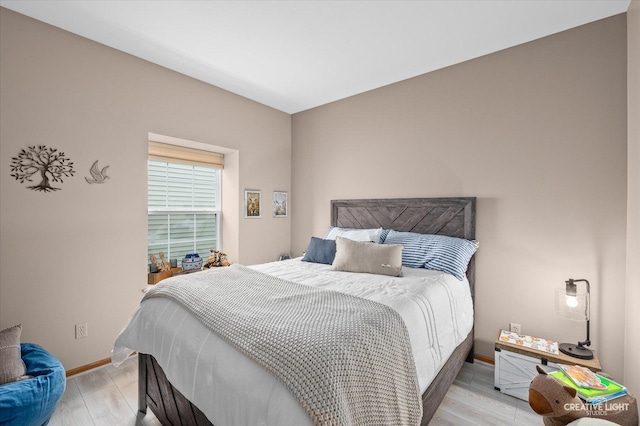204 Fairwind Dr, Montgomery, IL 60538 - bedroom featuring light wood finished floors and baseboards