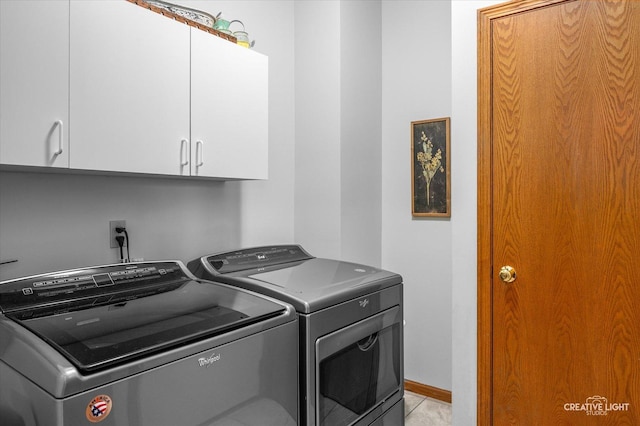 204 Fairwind Dr, Montgomery, IL 60538 - clothes washing area with separate washer and dryer and cabinet space