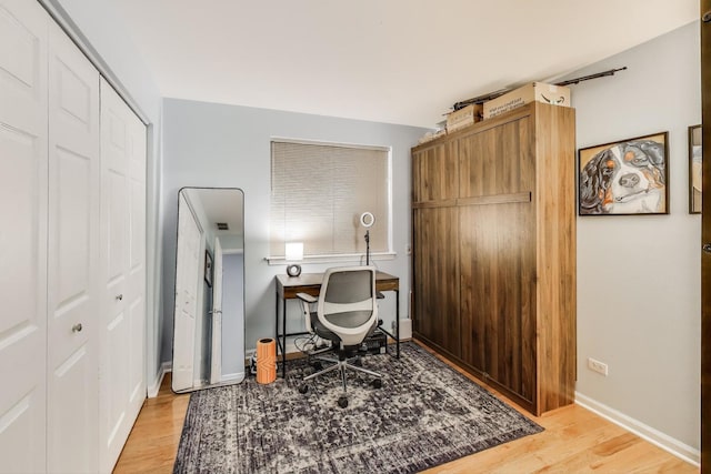 1473 N Larrabee St Unit A, Chicago, IL 60610 - office area featuring light wood-style floors and baseboards