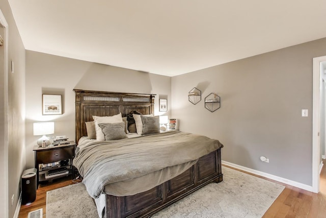 1473 N Larrabee St Unit A, Chicago, IL 60610 - bedroom featuring wood finished floors and baseboards
