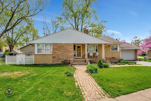 single story home with fence, covered porch, a front lawn, and brick siding
