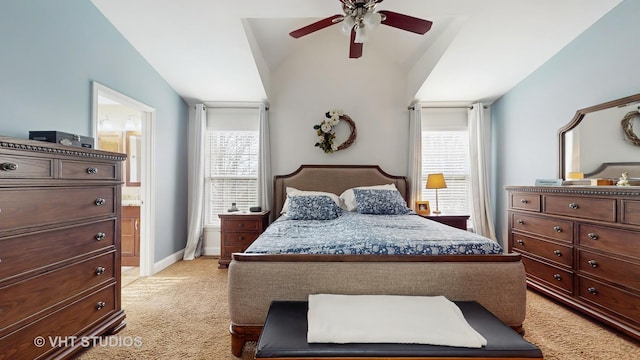 1734 Nashville Ln, Crystal Lake, IL 60014 - bedroom featuring a ceiling fan, connected bathroom, light colored carpet, baseboards, and lofted ceiling
