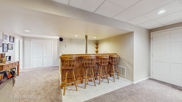 1734 Nashville Ln, Crystal Lake, IL 60014 - bar with carpet flooring, baseboards, visible vents, and a dry bar