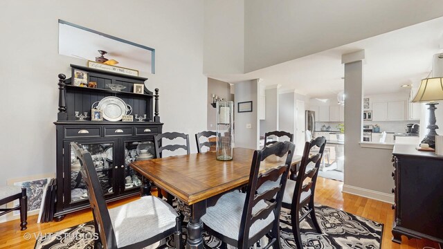 1734 Nashville Ln, Crystal Lake, IL 60014 - dining room with baseboards and light wood-type flooring