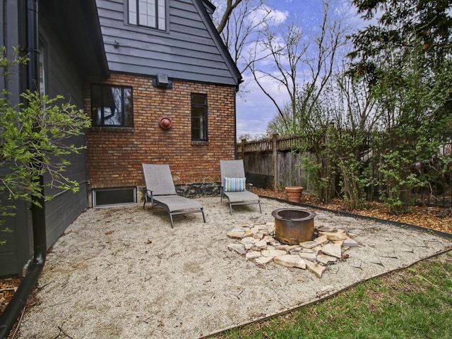 517 S Washington St, Wheaton, IL 60187 - view of patio / terrace with a fire pit and fence