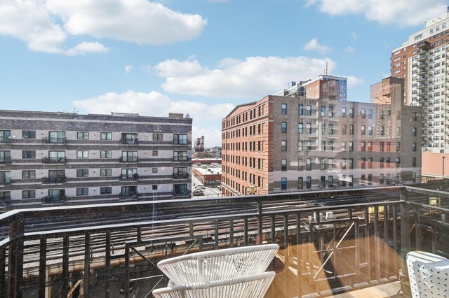 balcony featuring a city view