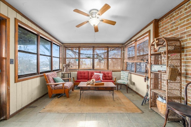 sunroom / solarium with an outdoor living space, a wealth of natural light, and ceiling fan