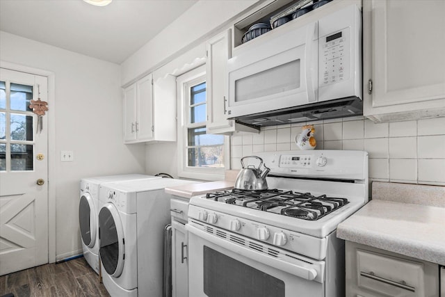 kitchen featuring decorative backsplash, white appliances, light countertops, white cabinets, and dark wood-type flooring