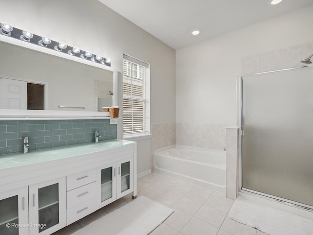 1683 Briarheath Dr, Aurora, IL 60505 - bathroom with a garden tub, a sink, tile patterned flooring, and a stall shower