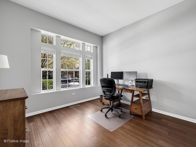 1683 Briarheath Dr, Aurora, IL 60505 - home office featuring baseboards, visible vents, and wood finished floors