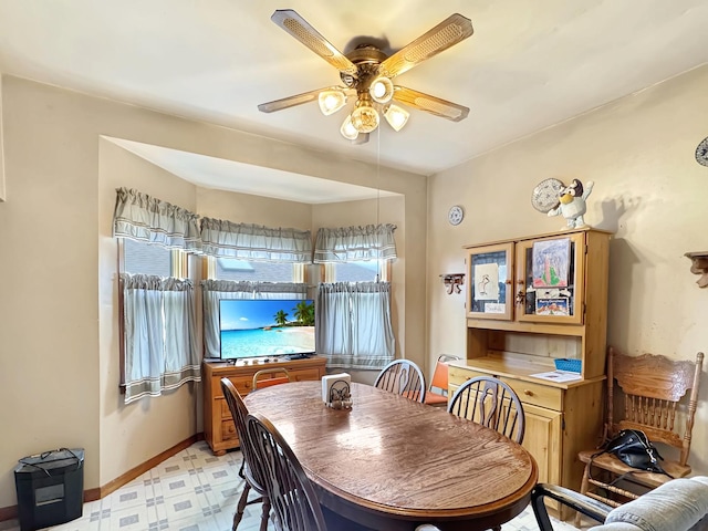 5927 W Elm Ave, Berkeley, IL 60163 - dining space with light floors, baseboards, and a ceiling fan
