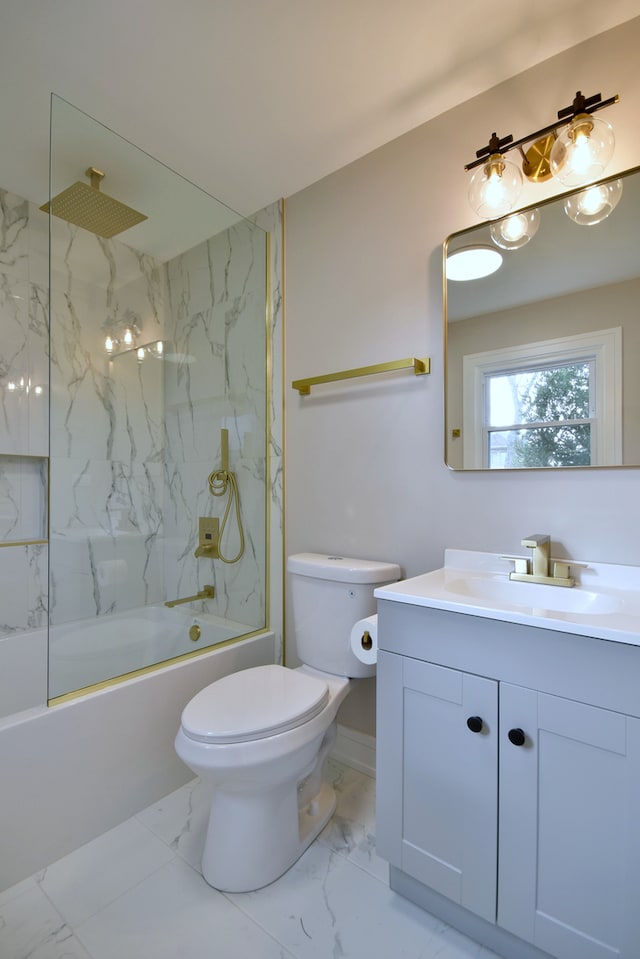 full bath with baseboards, toilet, bathing tub / shower combination, vanity, and marble finish floor