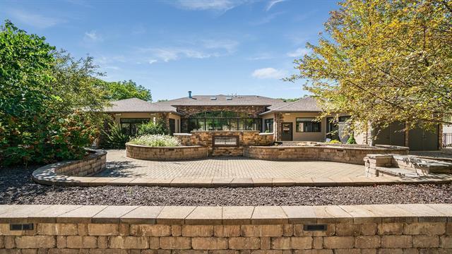 back of property with a patio