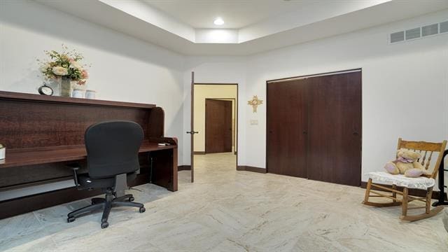 home office featuring visible vents and marble finish floor