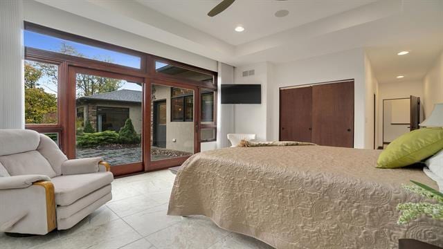 bedroom featuring ceiling fan, access to exterior, and recessed lighting
