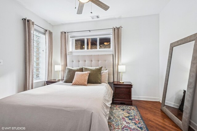 3705 N Paulina St Unit 3, Chicago, IL 60613 - bedroom featuring baseboards, ceiling fan, wood finished floors, and visible vents