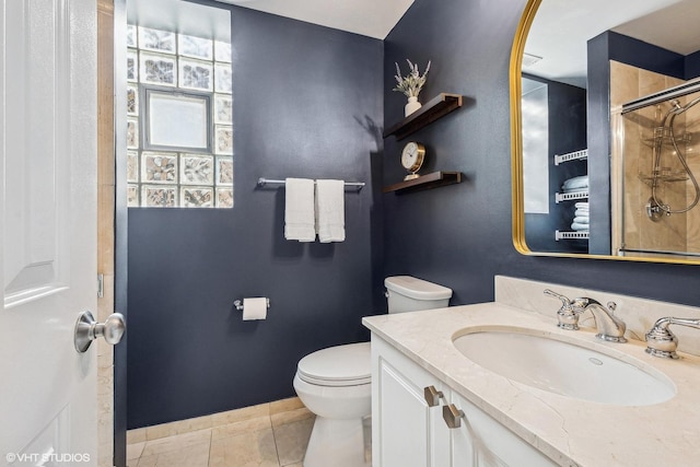 3705 N Paulina St Unit 3, Chicago, IL 60613 - bathroom featuring vanity, tile patterned flooring, a shower, toilet, and baseboards