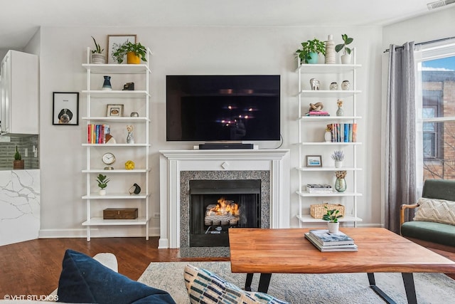 3705 N Paulina St Unit 3, Chicago, IL 60613 - living room with a fireplace with flush hearth, wood finished floors, and visible vents
