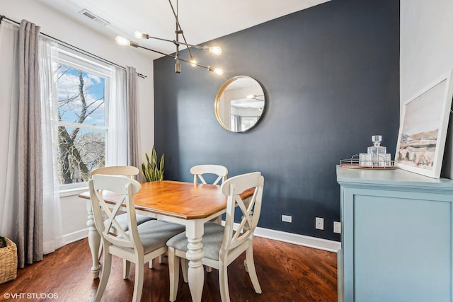 3705 N Paulina St Unit 3, Chicago, IL 60613 - dining area with baseboards, visible vents, and dark wood-type flooring