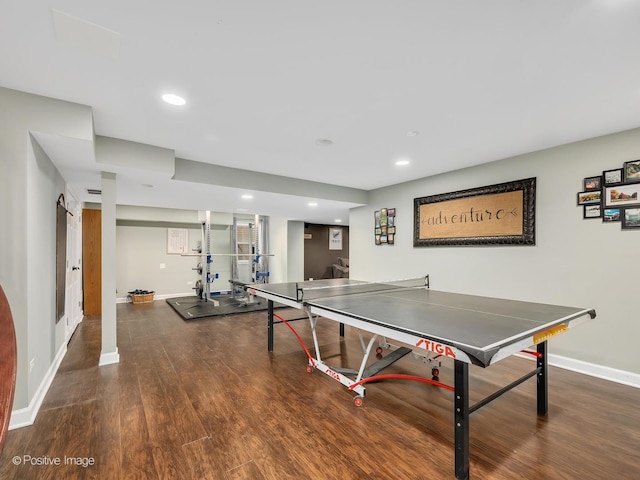 game room featuring baseboards, wood finished floors, and recessed lighting
