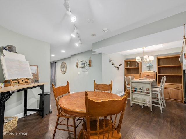 dining space featuring track lighting, an inviting chandelier, baseboards, dark wood-style flooring, and recessed lighting