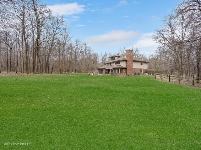 view of yard with fence