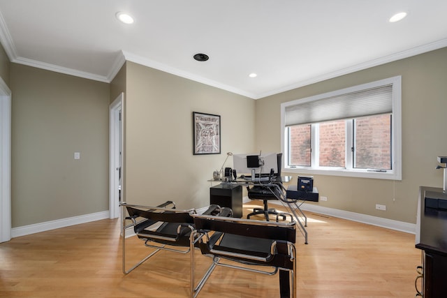 office area with light wood finished floors, crown molding, baseboards, and recessed lighting