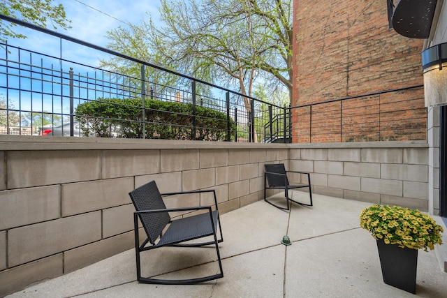 view of patio / terrace with fence
