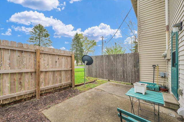 view of patio with fence