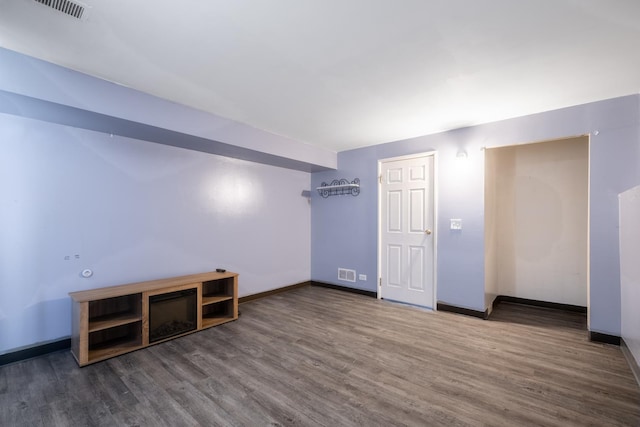 2532 Lee St, Woodridge, IL 60517 - bonus room featuring visible vents, baseboards, and wood finished floors