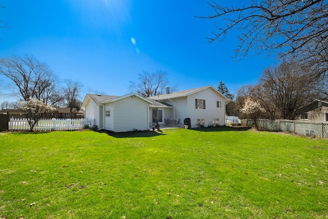 2532 Lee St, Woodridge, IL 60517 - rear view of house featuring a yard and fence private yard