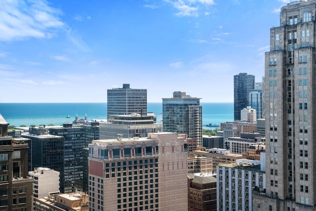 property's view of city with a water view