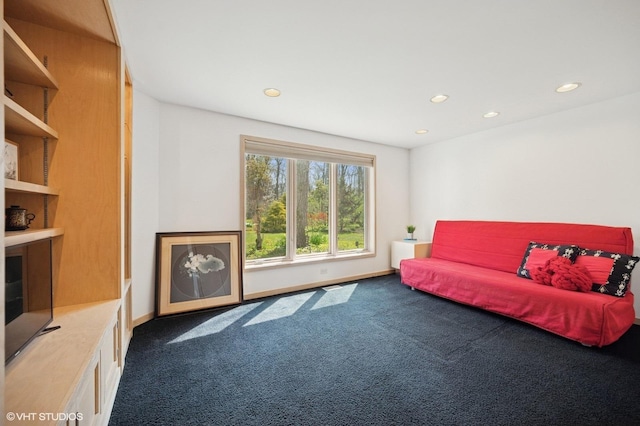 carpeted living room with baseboards and recessed lighting