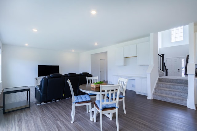 dining space featuring recessed lighting, baseboards, stairs, and dark wood-style flooring