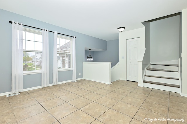 131 W Big Horn Dr Unit 131, Hainesville, IL 60030 - unfurnished room featuring light tile patterned flooring, visible vents, and baseboards