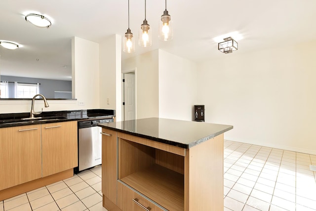 131 W Big Horn Dr Unit 131, Hainesville, IL 60030 - kitchen with dark countertops, dishwasher, light tile patterned floors, a sink, and a center island