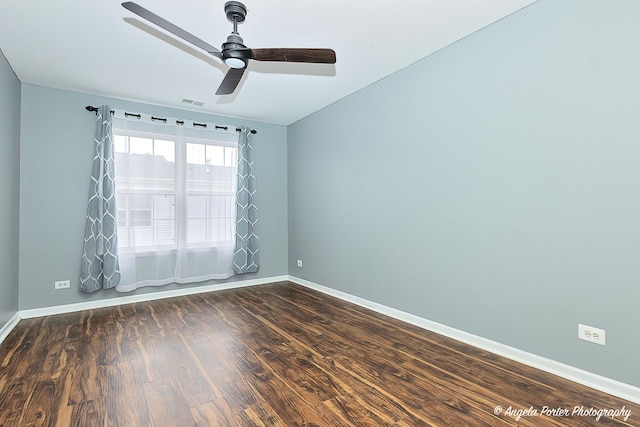 131 W Big Horn Dr Unit 131, Hainesville, IL 60030 - empty room with visible vents, baseboards, dark wood-style floors, and ceiling fan