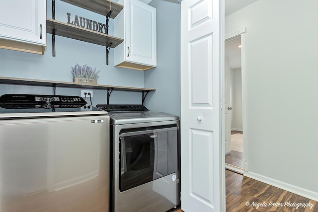 131 W Big Horn Dr Unit 131, Hainesville, IL 60030 - laundry area with washing machine and clothes dryer, cabinet space, dark wood-type flooring, and baseboards