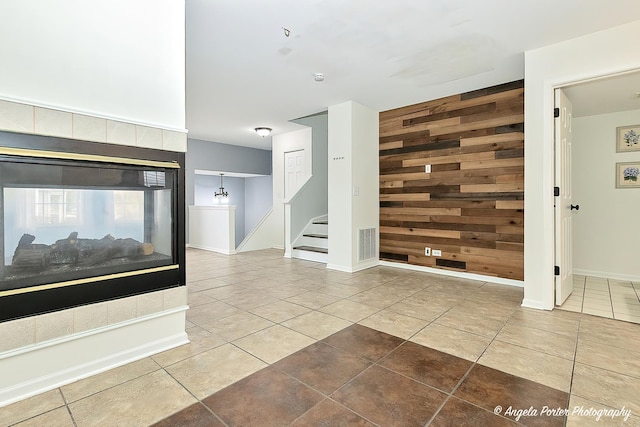 131 W Big Horn Dr Unit 131, Hainesville, IL 60030 - interior space with stairs, baseboards, wood walls, tile patterned flooring, and visible vents