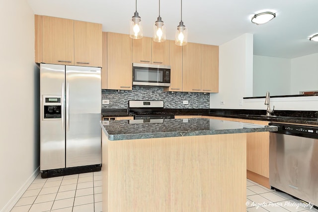131 W Big Horn Dr Unit 131, Hainesville, IL 60030 - kitchen with stainless steel appliances, light brown cabinets, light tile patterned floors, a center island, and tasteful backsplash