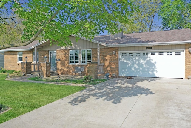 414 Ridgecrest Dr, Washington, IL 61571 - view of front of house featuring concrete driveway, brick siding, and a garage