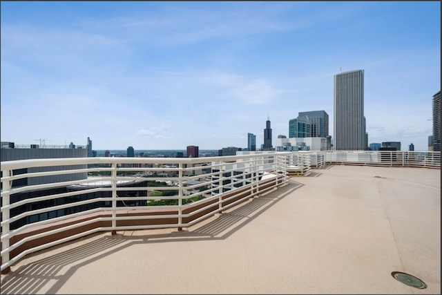 view of patio / terrace featuring a city view