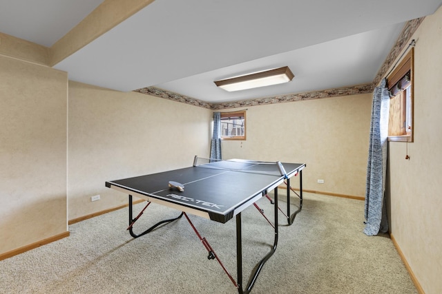 game room with baseboards and carpet