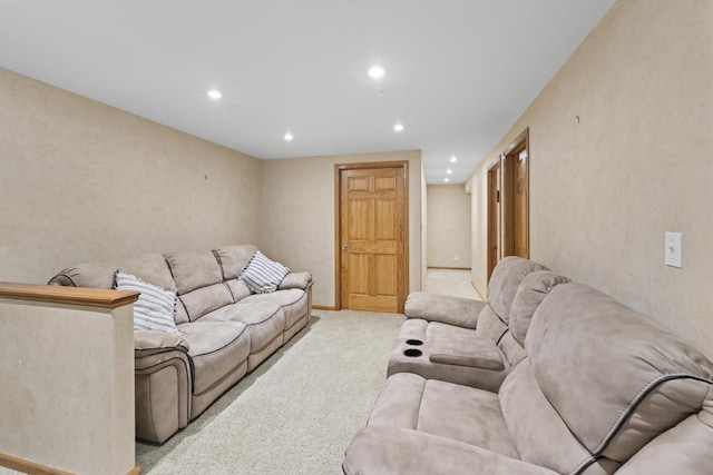 living room featuring carpet floors and recessed lighting